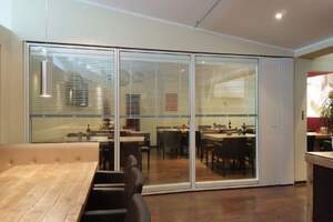 Изделия из Алюминия и Стекла: Остекление фасадов, Входные группы, Двери, Перегородки, Окна.